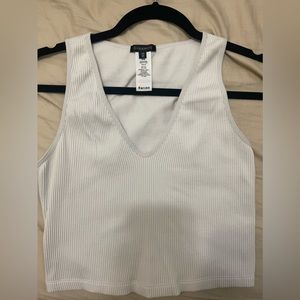 Cropped V neck top